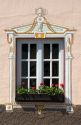 Window with flower box on a business in the alpine village of Garmisch, Germany.