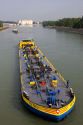 Barge on the Rhine River between France and Germany near Frieberg, Germany.