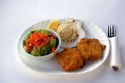 Haddock fish dinner served in restaurant at Halls Harbor, Nova Scotia, Canada.