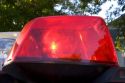 Flashing lights on top of a police car.