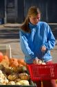 A woman shops at a farmers market in Canyon County, Idaho. MR