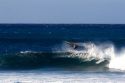 Windsurfing in the pacific ocean off the island of Maui, Hawaii.