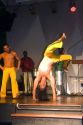 Men perform a martial arts dance called  Capoeira at a nightclub in Sao Paulo, Brazil.