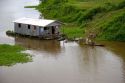 Housing on the Arasa River in the Amazon jungle near Manaus, Brazil.