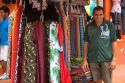 A vendor selling hammocks at an outdoor market in Manaus, Brazil.