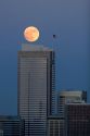 Full moon over the city of Seattle, Washington and the Two Union Square Building.