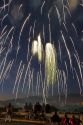 People watch a Fourth of July fireworks display in Boise, Idaho.