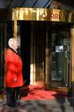 Doorman standing at the entrance to the Royal Carre Theatre in Amsterdam, Netherlands.