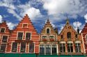 Colorful building facades in The Big Market Square at Bruges in the province of West Flanders, Belgium.