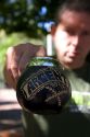 Street vendor selling carved gourds used to drink mate at Plaza Derrego in Buenos Aires, Argentina.