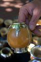 Street vendor selling carved gourds used to drink mate at Plaza Derrego in Buenos Aires, Argentina.