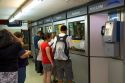 People buy tickets for the Buenos Aires Metro in Argentina.