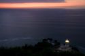 Monte Igueldo Lighthouse at sunset in La Concha Bay near the city of Donostia-San Sebastian, Guipuzcoa, Basque Country, Northern Spain.