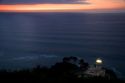 Monte Igueldo Lighthouse at sunset in La Concha Bay near the city of Donostia-San Sebastian, Guipuzcoa, Basque Country, Northern Spain.
