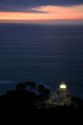 Monte Igueldo Lighthouse at sunset in La Concha Bay near the city of Donostia-San Sebastian, Guipuzcoa, Basque Country, Northern Spain.