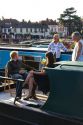 People socialize on boats in the River Avon at Stratford-upon-Avon, Warwickshire, England. MR