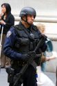 New York City Police Department Emergency Service Unit officer on Wall Street in New York City, New York, USA.