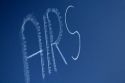 Small airplane sky writing over Boise, Idaho, USA.