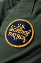 United States Border Patrol patch on an agent at the U.S./Mexico border along the All American Canal near Calexico, California