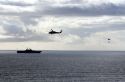 USS Bonhomme Richard Amphibious Assault Ship of the United States Navy being resupplied by helicopter in the Pacific Ocean near Camp Pendleton, California, USA.