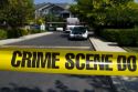 Police crime scene tape warning against entering a crime area in Boise, Idaho, USA.