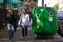 Curbside glass recycling bin in Paris, France.