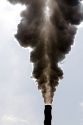 Industrial smokestack venting hot flue gases.