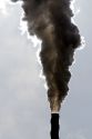 Industrial smokestack venting hot flue gases.