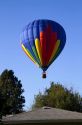 Hot air balloon landing in a residential area of Boise, Idaho, USA.
