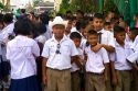 Thai school students wearing uniforms visit The Grand Palace in Bangkok, Thailand.