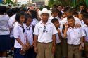 Thai school students wearing uniforms visit The Grand Palace in Bangkok, Thailand.