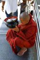 Buddhist monk with alms bowl in (Rangoon) Yangon, (Burma) Myanmar.