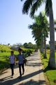 People walk along Inya Lake in (Rangoon) Yangon, (Burma) Myanmar.