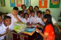 Teacher and students at a Thai elementary school on the island of Ko Samui, Thailand.