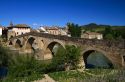 Six-arched Roman bridge spanning the Arga River on the Way of St. James pilgrimage route in Puente La Reina, Navarra, Spain.