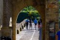Six-arched Roman bridge spanning the Arga River on the Way of St. James pilgrimage route in Puente La Reina, Navarra, Spain.