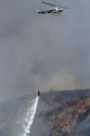 Helicopter dropping water on a wildfire near Boise, Idaho, USA.
